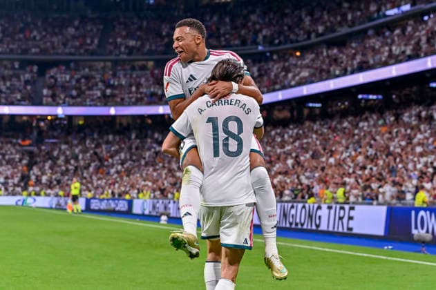 September 12, 2026, Madrid, Madrid, Spain: 18 ALVARO CARRERAS of Real Madrid CF and 10 KYLIAN MBAPPE of Real Madrid CF celebrates a goal (2-0) during the match on Matchday 5 of the 2026 27 National League First Division Championship between REAL MADRID C.F. 4 and RAYO VALLECANO 1, played at the Bernabo u Stadium on September 12, 2026, in Madrid, Spain. Madrid Spain - ZUMAc312 20260912_zsp_c312_071 Copyright: xOscarxManuelxSanchezx