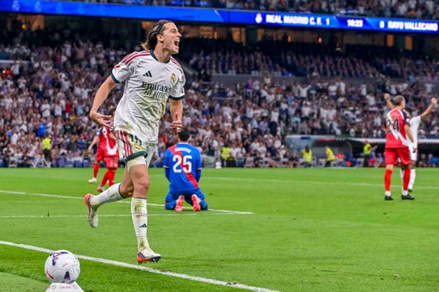 September 12, 2026, Madrid, Madrid, Spain: 18 ALVARO CARRERAS of Real Madrid CF celebrates a goal (2-0) during the match on Matchday 5 of the 2026 27 National League First Division Championship between REAL MADRID C.F. 4 and RAYO VALLECANO 1, played at the Bernabo u Stadium on September 12, 2026, in Madrid, Spain. Madrid Spain - ZUMAc312 20260912_zsp_c312_063 Copyright: xOscarxManuelxSanchezx