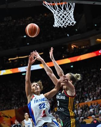 (260913) -- BERLIN, Sept. 13, 2026 -- Marieme Badiane (L) of France shoots during the semifinal match between France and Germany at the FIBA Women s Basketball World Cup 2026 in Berlin, Germany, Sept. 12, 2026. ) (SP)GERMANY-BERLIN-BASKETBALL-WOMEN S WORLD CUP-SEMIFINAL-FRA VS GER ZhangxHaofu 