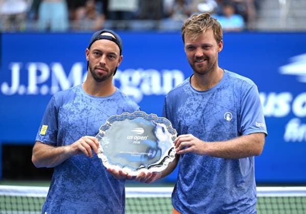 (260913) -- NEW YORK, Sept. 13, 2026 -- Kevin Krawietz Tim Puetz pose for photos during the awarding ceremony after the men s doubles final match between Christian Harrison (the United States) Neal Skupski (Britain) and Kevin Krawietz Tim Puetz of Germany at the 2026 US Open tennis championships in New York, the United States, Sept. 12, 2026. ) (SP)U.S.-NEW YORK-TENNIS-US OPEN-MEN S DOUBLES-FINAL LixRui 