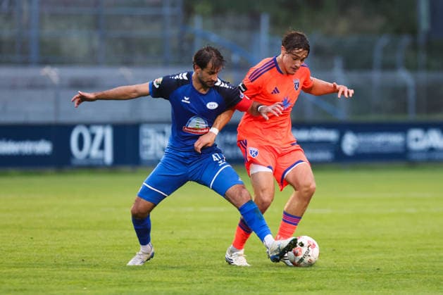 September 12, 2026, Soccer, Men s, Regionalliga Nord, Matchday 8, BSV Kickers Emden vs. SSV Jeddeloh II, Ole Kühling (orange, 34) of BSV Kickers Emden in a tackle with Gazi Siala (47) of SSV Jeddeloh II