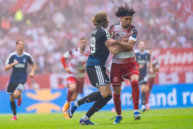 Anas Slimani of Fortuna Düsseldorf, 34, is held by Joshua Bitter of MSV Duisburg, 29. Fortuna Düsseldorf vs. MSV Duisburg, Soccer, 3rd Division, Matchday 5, 2026–27 season, September 12, 2026, DFL regulations prohibit any use of photographs as image sequences and or quasi-video. Fortuna Düsseldorf vs. MSV Duisburg, soccer, 3. Liga, Matchday 5, 2026–27 season, September 12, 2026, Düsseldorf Copyright: xEibner-Pressefoto LukasxBaldygax EP_LBA