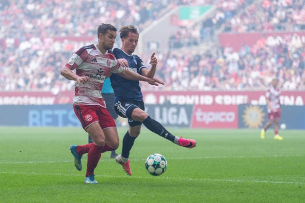 Tim Oberdorf of Fortuna Düsseldorf, No. 15, in a tackle with Christian Viet of MSV Duisburg, No. 10; Fortuna Düsseldorf vs. MSV Duisburg, soccer, 3. Liga, Matchday 5, 2026–27 season, September 12, 2026, DFL regulations prohibit any use of photographs as image sequences and or quasi-video. Fortuna Düsseldorf vs. MSV Duisburg, soccer, 3rd Division, Matchday 5, 2026–27 season, September 12, 2026, Düsseldorf Copyright: xEibner-Pressefoto LukasxBaldygax EP_LBA
