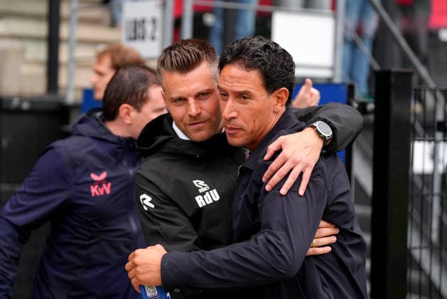 Eredivisie: Excelsior Rotterdam v FC Utrecht Rotterdam - Coach Ruben den Uil of Excelsior Rotterdam talks with Coach Anthony Correia of FC Utrecht during the sixth competition round of the 2026 2027 Eredivisie season. The match is set between Excelsior Rotterdam and FC Utrecht at Stadion Woudestein on 13 September 2026 in Rotterdam, Netherlands. (Hero Images Nick Koole) Copyright: xNickxKoolex