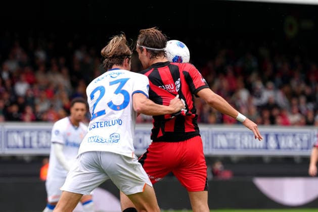 Eredivisie: Excelsior Rotterdam v FC Utrecht Rotterdam - Agust Orri Thorsteinsson of Excelsior Rotterdam battles for possession with Niklas Nielsen of FC Utrecht during the sixth competition round of the 2026 2027 Eredivisie season. The match is set between Excelsior Rotterdam and FC Utrecht at Stadion Woudestein on 13 September 2026 in Rotterdam, Netherlands. (Hero Images Nick Koole) Copyright: xNickxKoolex