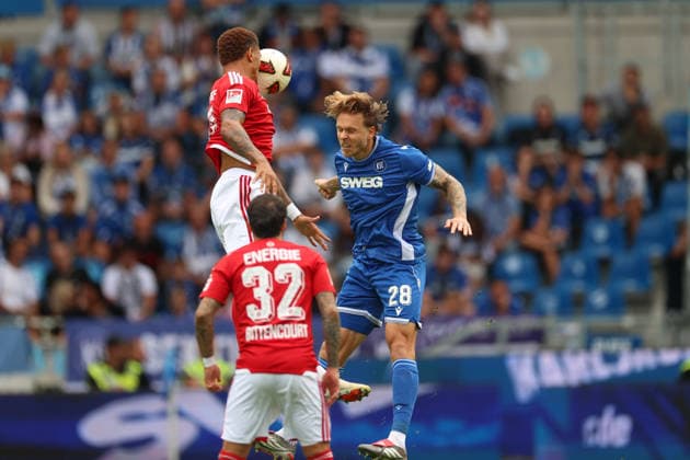 Justin Butler (Energie Cottbus), 31, in a tackle with Marcel Franke (Karlsruher SC), 28, Karlsruher SC vs. Energie Cottbus, 2. Bundesliga, Matchday 5, 2026–2027, September 13, 2026, DFL regulations prohibit any use of photographs as image sequences and or quasi-video, Karlsruher SC vs. Energie Cottbus, 2. Bundesliga, Matchday 5, 2026–2027, September 13, 2026, Karlsruhe Copyright: xEibner-Pressefoto JanxPrihodax EP_JPA