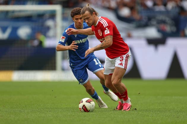 Henry Rorig (Energie Cottbus, No. 03) in a tackle with Louey Ben Farhat (Karlsruher SC, No. 19), Karlsruher SC vs. Energie Cottbus, 2. Bundesliga, Matchday 5, 2026–2027, September 13, 2026, DFL regulations prohibit any use of photographs as image sequences and or quasi-video, Karlsruher SC vs. Energie Cottbus, 2. Bundesliga, Matchday 5, 2026–2027, September 13, 2026, Karlsruhe Copyright: xEibner-Pressefoto JanxPrihodax EP_JPA