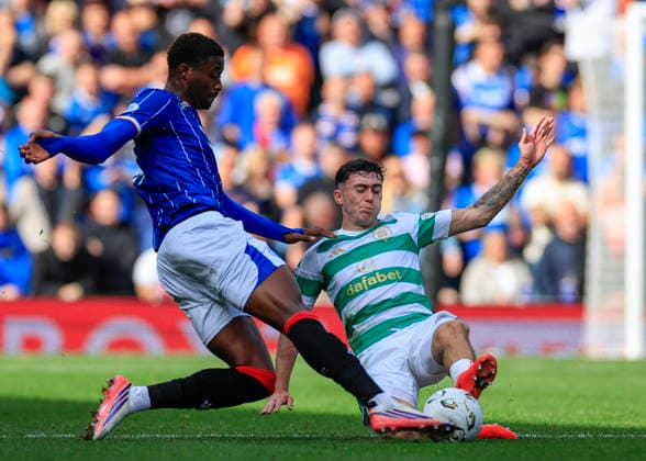 Rangers v Celtic Premier Sports Cup Djeidi Gassama of Rangers competes for the ball with Colby Donovan of Celtic during the Premier Sports Cup Quarter-Final match at Ibrox Stadium, Glasgow 13 09 2026 UK Newspapers OUT Copyright: xFredxPalmerx FIL-23941-0059