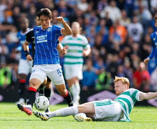 130926 Rangers v Celtic: Minsu Kim of Rangers tackled by Liam Scales of Celtic  Copyright: xWilliexVassx NINTCHDBPICT001108077509