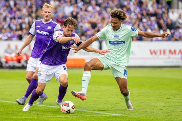 L R Jannik Mueller (VfL Osnabrück), 24, in a tackle with Oluwaseun Adewumi (Hertha BSC), 19, GER, VfL Osnabrück vs. Hertha BSC, Soccer, 2. Bundesliga, Matchday 5, 2026–2027 season, September 13, 2026 DFL regulations prohibit any use of photographs as image sequences and or quasi-video GER, VfL Osnabrück vs. Hertha BSC, soccer, 2. Bundesliga, Matchday 5, 2026–2027 season, September 13, 2026 Osnabrück Copyright: xEibner-Pressefoto JanxRollingerx EP_JSK
