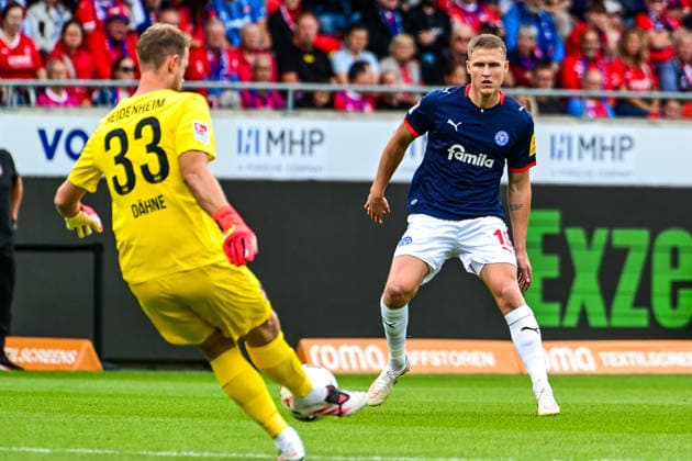 September 13, 2026, GER, Soccer, Men s, 2. Bundesliga, 1. FC Heidenheim vs. Holstein Kiel; Thomas Dähne (Heidenheim, 33), Phil Harres (Kiel, 19); Heidenheim Voith Arena, Baden-Württemberg, Germany Copyright: xNordphotox xHafnerx