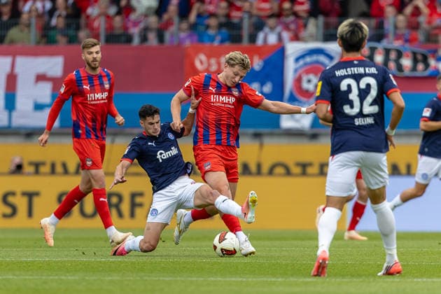Tough tackle: Guillermo Balzi (Holstein Kiel), 08 Alessandro Vogt (1 FC Heidenheim), 18 Graetsche (in front of him) Hiroki Sekine (Holstein Kiel), 32, GER, 1 FC Heidenheim vs. Holstein Kiel, Soccer, 2. Bundesliga, Matchday 5, 2026–2027 Season, September 13, 2026, DFL and DFB regulations prohibit any use of photographs as image sequences and or quasi-video, GER, 1 FC Heidenheim vs. Holstein Kiel, Soccer, 2. Bundesliga, Matchday 5, 2026–2027 Season, September 13, 2026, Heidenheim Copyright: xEibner-Pressefoto JanixPlessx EP_JPL