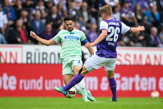 2. Bundesliga, Matchday 26, 27: VfL Osnabrück vs. Hertha BSC Berlin on September 13, 2026, at Bremer Brücke in Osnabrück; Josip Brekalo of Berlin in a tackle against Fridolin Wagner of Osnabrück MT