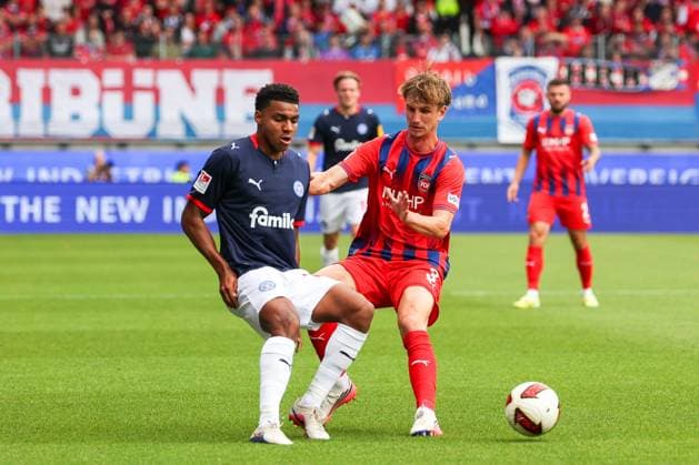 Ikem Ugoh (27, Holstein Kiel) and Jan Schoeppner (3, 1. FC Heidenheim 1846) in action, 1. FC Heidenheim 1846 vs. Holstein Kiel, Soccer, DFL, 2. Bundesliga, 2026–2027 season, First Half of the Season, Matchday 5, September 13, 2026, Heidenheim, Baden-Württemberg, Germany Copyright: xkolbert-press MartinxAgüerax
