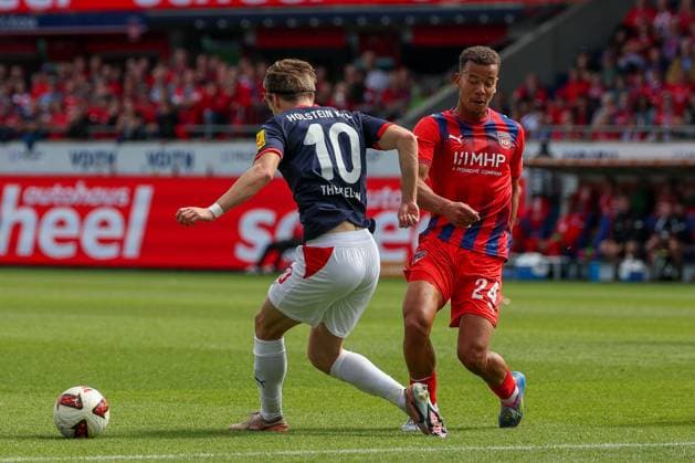 Jonas Therkelsen (10, Holstein Kiel) in action with Marcel Costly (24, 1. FC Heidenheim 1846), 1. FC Heidenheim 1846 vs. Holstein Kiel, Soccer, DFL, 2. Bundesliga, 2026–2027 season, First Half of the Season, Matchday 5, September 13, 2026, Heidenheim, Baden-Württemberg, Germany Copyright: xkolbert-press MartinxAgüerax