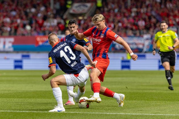 Tackle: Alessandro Vogt (1 FC Heidenheim), 18 Ivan Nekic (Holstein Kiel), 13 Guillermo Balzi (Holstein Kiel), 08, GER, 1 FC Heidenheim vs. Holstein Kiel, Soccer, 2. Bundesliga, Matchday 5, 2026–2027 season, September 13, 2026, DFL and DFB regulations prohibit any use of photographs as image sequences and or quasi-video, GER, 1 FC Heidenheim vs. Holstein Kiel, Soccer, 2. Bundesliga, Matchday 5, 2026–2027 Season, September 13, 2026, Heidenheim Copyright: xEibner-Pressefoto JanixPlessx EP_JPL
