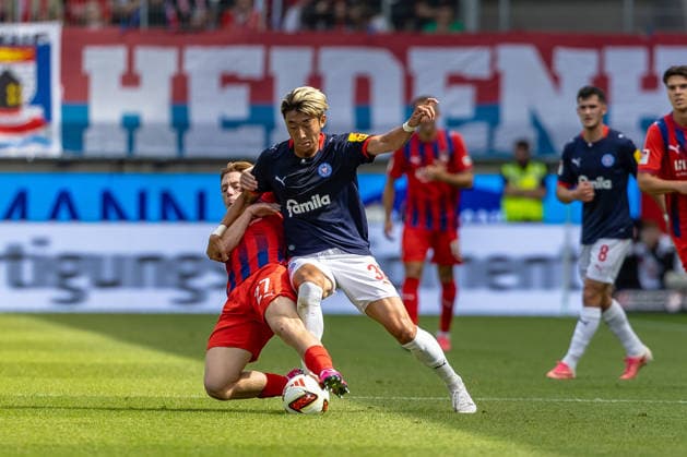 Tough tackle by Michael Heule (1 FC Heidenheim, 27) on Hiroki Sekine (Holstein Kiel, 32), GER, 1 FC Heidenheim vs. Holstein Kiel, Soccer, 2. Bundesliga, Matchday 5, 2026–2027 Season, September 13, 2026, DFL and DFB regulations prohibit any use of photographs as image sequences and or quasi-video, GER, 1 FC Heidenheim vs. Holstein Kiel, Soccer, 2. Bundesliga, Matchday 5, 2026–2027 Season, September 13, 2026, Heidenheim Copyright: xEibner-Pressefoto JanixPlessx EP_JPL