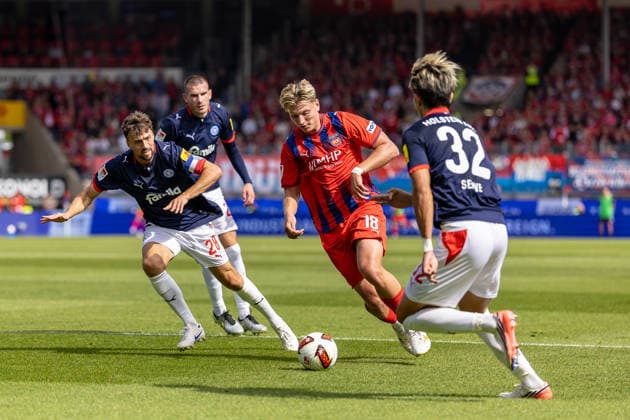 Tackle: Jonas Meffert (Holstein Kiel), 28; Alessandro Vogt (1 FC Heidenheim), 18; Hiroki Sekine (Holstein Kiel), 32, GER, 1 FC Heidenheim vs. Holstein Kiel, Soccer, 2. Bundesliga, Matchday 5, 2026–2027 Season, September 13, 2026, DFL and DFB regulations prohibit any use of photographs as image sequences and or quasi-video, GER, 1 FC Heidenheim vs. Holstein Kiel, Soccer, 2. Bundesliga, Matchday 5, 2026–2027 Season, September 13, 2026, Heidenheim Copyright: xEibner-Pressefoto JanixPlessx EP_JPL