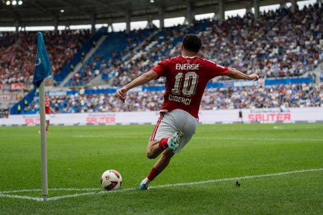 September 13, 2026, xjyhynx, Soccer 2. Bundesliga, Karlsruher SC vs. Energie Cottbus, corner kick by Tolcay Cigerci 10, Energie Cottbus DFL DFB REGULATIONS PROHIBIT ANY USE OF PHOTOGRAPHS as IMAGE SEQUENCES and or QUASI-VIDEO Karlsruhe