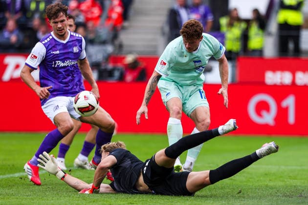 September 13, 2026, xkwix, Soccer, 2nd Division, VfL Osnabrück vs. Hertha BSC, Stadion an der Bremer Brücke, Matchday 5, 2026–2027 season: Jonas Krumrey (VfL Osnabrück, No. 32) in a tackle against Sebastian Groenning (Hertha BSC, No. 17). DFB regulations prohibit any use of photographs as image sequences and or quasi-video. Photo: xKamilxWilkowskixPressefotoKochx, Lower Saxony Germany