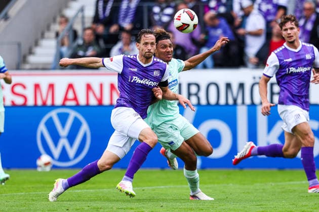September 13, 2026, xkwix, Soccer, 2nd Division, VfL Osnabrück vs. Hertha BSC, Stadion an der Bremer Brücke, Matchday 5, 2026–2027 season: Jannik Mueller (VfL Osnabrück, No. 24) in a tackle against Oluwaseun Adewumi (Hertha BSC, No. 19). DFB regulations prohibit any use of photographs as image sequences and or quasi-video. Photo: xKamilxWilkowskixPressefotoKochx Lower Saxony, Germany