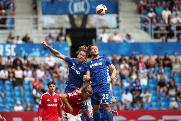 Christoph Kobald (Karlsruher SC, 22) and Marcel Franke (Karlsruher SC, 28) going for a header together, Karlsruher SC vs. Energie Cottbus, 2. Bundesliga, Matchday 5, 2026–2027, September 13, 2026, DFL regulations prohibit any use of photographs as image sequences and or quasi-video. Karlsruher SC vs. Energie Cottbus, 2. Bundesliga, Matchday 5, 2026–2027, September 13, 2026, Karlsruhe Copyright: xEibner-Pressefoto JanxPrihodax EP_JPA
