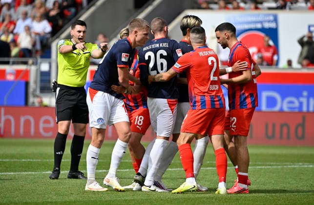 Scramble for a corner kick: David Zec (Holstein Kiel) 26, Marnon Busch (1. FC Heidenheim 1846 FCH) 02. Referee: Justin Hasmann. 1. FC Heidenheim 1846 FCH vs. Holstein Kiel KSV, September 13, 2026. DFL REGULATIONS PROHIBIT ANY USE OF PHOTOGRAPHS AS IMAGE SEQUENCES AND OR QUASI-VIDEO 1 FC Heidenheim 1846 FCH vs. Holstein Kiel KSV
