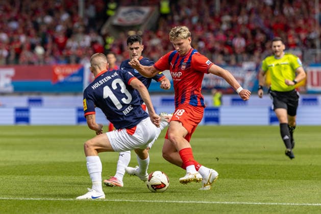 Tackle: Ivan Nekic (Holstein Kiel), 13 Alessandro Vogt (1 FC Heidenheim), 18 behind him Guillermo Balzi (Holstein Kiel), 08, GER, 1 FC Heidenheim vs. Holstein Kiel, Soccer, 2. Bundesliga, Matchday 5, 2026–2027 season, September 13, 2026, DFL and DFB regulations prohibit any use of photographs as image sequences and or quasi-video, GER, 1 FC Heidenheim vs. Holstein Kiel, Soccer, 2. Bundesliga, Matchday 5, 2026–2027 season, September 13, 2026, Heidenheim Copyright: xEibner-Pressefoto JanixPlessx EP_JPL