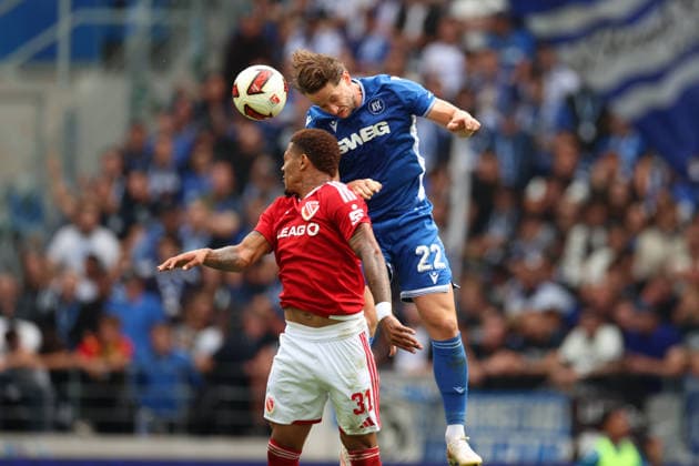 Christoph Kobald (Karlsruher SC), 22, in a duel with Justin Butler (Energie Cottbus), 31, Karlsruher SC vs. Energie Cottbus, 2. Bundesliga, Matchday 5, 2026–2027, September 13, 2026, DFL regulations prohibit any use of photographs as image sequences and or quasi-video, Karlsruher SC vs. Energie Cottbus, 2. Bundesliga, Matchday 5, 2026–2027, September 13, 2026, Karlsruhe Copyright: xEibner-Pressefoto JanxPrihodax EP_JPA