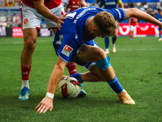 September 13, 2026, xwppx, Soccer 2. Bundesliga, Karlsruher SC vs. Energie Cottbus by Noel Eichinger, Karlsruher SC in a tackle. DFL and DFB regulations prohibit any use of photographs as image sequences and or quasi-video. Karlsruhe