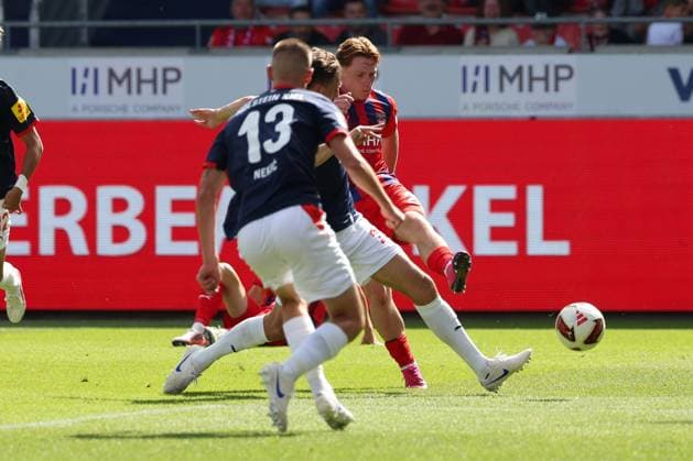 Michael Heule 27, 1. FC Heidenheim 1846, in action against Ivan Nekic (No. 13), Holstein Kiel; 1. FC Heidenheim 1846 vs. Holstein Kiel, Soccer, DFL, 2. Bundesliga, 2026–2027 Season, First Half of the Season, Matchday 5, September 13, 2026, Heidenheim, Baden-Württemberg, Germany Copyright: xkolbert-press MartinxAgüerax