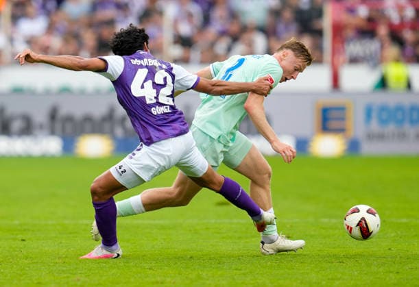 Jonathan Gomez (VfL Osnabrück), 42, in a tackle with Julian Eitschberger (Hertha BSC), 2 GER, VfL Osnabrück vs. Hertha BSC, 2. Bundesliga, Matchday 5, 2026–27 season, Bremer Brücke, Osnabrück, September 13, 2026 DFL regulations prohibit any use of photographs as image sequences and or quasi-video. Photo: HMB Media, Scott W. Coleman Copyright: HMBxMedia xScottxW.xColeman