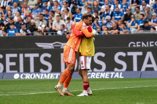 September 13, 2026, xjyhynx, Soccer 2. Bundesliga, Karlsruher SC vs. Energie Cottbus, goal celebration for the 2–0 by Marcel Lotka 1, Energie Cottbus and Tim Campulka 4, Energie Cottbus. DFL and DFB regulations prohibit any use of photographs as image sequences and or quasi-video. Karlsruhe