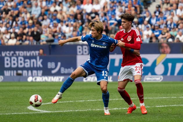September 13, 2026, xjyhynx, Soccer 2. Bundesliga, Karlsruher SC vs. Energie Cottbus, Shio Fukuda 13, Karlsruher SC in a tackle with Luca Erlein 21, Energie Cottbus DFL DFB REGULATIONS PROHIBIT ANY USE OF PHOTOGRAPHS as IMAGE SEQUENCES and or QUASI-VIDEO Karlsruhe