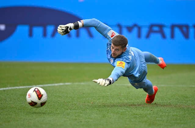 Goalkeeper Timon Weiner, Holstein Kiel 01, in action: 1 FC Heidenheim 1846 FCH vs. Holstein Kiel KSV, September 13, 2026. DFL regulations prohibit any use of photographs as image sequences and or quasi-video. 1 FC Heidenheim 1846 (FCH) vs. Holstein Kiel KSV
