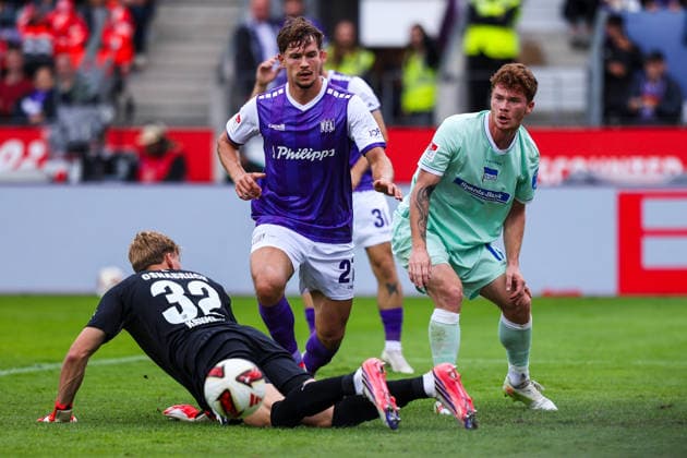 September 13, 2026, xkwix, Soccer, 2nd Division, VfL Osnabrück vs. Hertha BSC, Stadion an der Bremer Brücke, Matchday 5, 2026–2027 Season: Jonas Krumrey (VfL Osnabrück, 32) in a tackle against Sebastian Groenning (Hertha BSC, 17). DFB regulations prohibit any use of photographs as image sequences and or quasi-video. Photo: xKamilxWilkowskixPressefotoKochx, Lower Saxony Germany