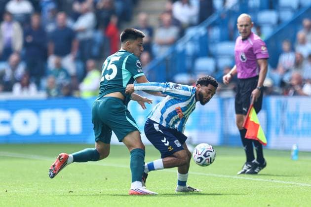 Jay Dasilva of Coventry City battles with Diego Gomez of Brighton & Hove Albion Coventry City v Brighton and Hove Albion, Premier League, Football, Football, Coventry Building Society Arena, Coventry, UK - 13 Sep 2026Coventry Coventry Building Society Arena United Kingdom EDITORIAL USE ONLY No use with unauthorised audio, video, data, fixture lists, club league logos or live services. Online in-match use limited to 120 images, no video emulation. No use in betting, games or single club league player publications.  Copyright: xMichaelxZemanek Shutterstockx 17144597aj