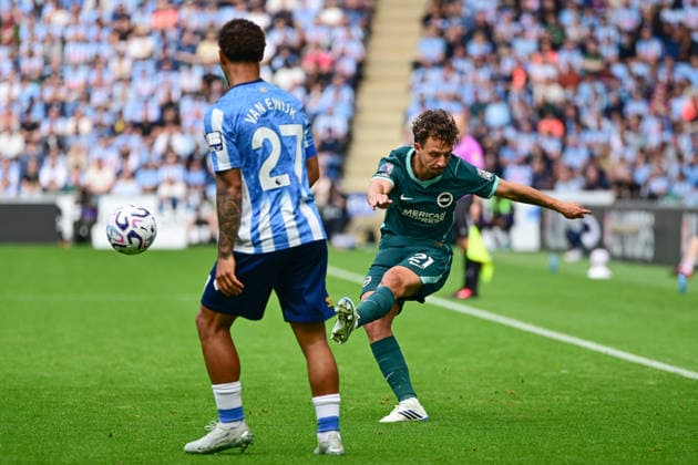 Coventry City v Brighton and Hove Albion, Premier League Brighton and Hove Albion defender Olivier Boscagli (21) crosses under pressure from Coventry City defender Milan Van Ewijk (27) during the Premier League match between Coventry City and Brighton and Hove Albion at the Coventry Building Society Arena, Coventry, UK on 13 September 2026. Coventry Coventry Building Society Arena West Midlands UK Editorial use only DataCo restrictions apply See www.football-dataco.com , Copyright: xDennisxGoodwinx PSI-24865-0022