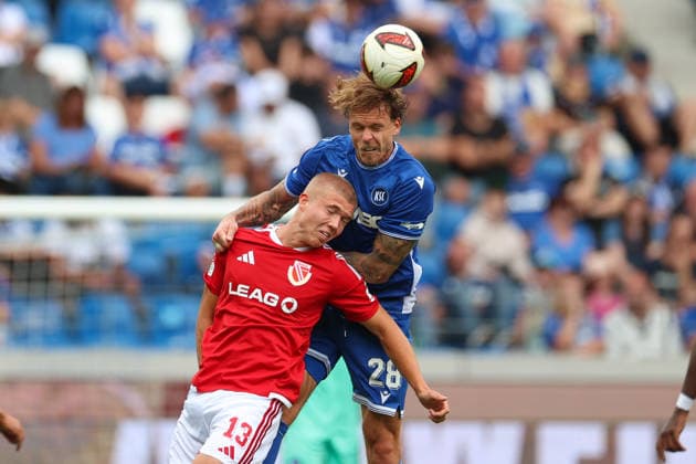 Dmytro Bogdanov (Energie Cottbus, No. 13) in a duel with Marcel Franke (Karlsruher SC, No. 28), Karlsruher SC vs. Energie Cottbus, 2. Bundesliga, Matchday 5, 2026–2027, September 13, 2026, DFL regulations prohibit any use of photographs as image sequences and or quasi-video, Karlsruher SC vs. Energie Cottbus, 2. Bundesliga, Matchday 5, 2026–2027, September 13, 2026, Karlsruhe Copyright: xEibner-Pressefoto JanxPrihodax EP_JPA