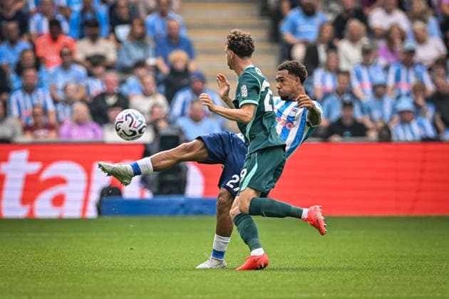 13th September 2026; Coventry Building Society Arena, Coventry, West Midlands, England; Premier League Football, Coventry City versus Brighton and Hove Albion; Milan van Ewijk of Coventry City clears the ball ahead of Maxim De Cuyper of Brighton and Hove Albion GodfreyxPitt