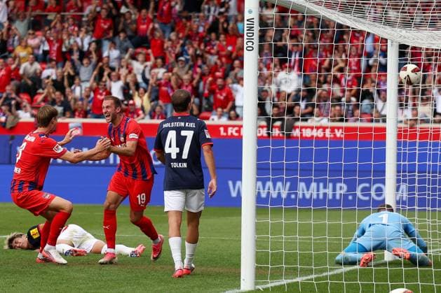 Jonas Foehrenbach (19) of 1. FC Heidenheim 1846 celebrates a goal after the 1–0 win; Timon Weiner (1) of Holstein Kiel is on the ground, alongside John Tolkin (47) of Holstein Kiel, 1 FC Heidenheim 1846 vs. Holstein Kiel, Soccer, DFL, 2. Bundesliga, 2026–2027 Season, First Half of the Season, Matchday 5, September 13, 2026, Heidenheim, Baden-Württemberg, Germany Copyright: xkolbert-press MartinxAgüerax