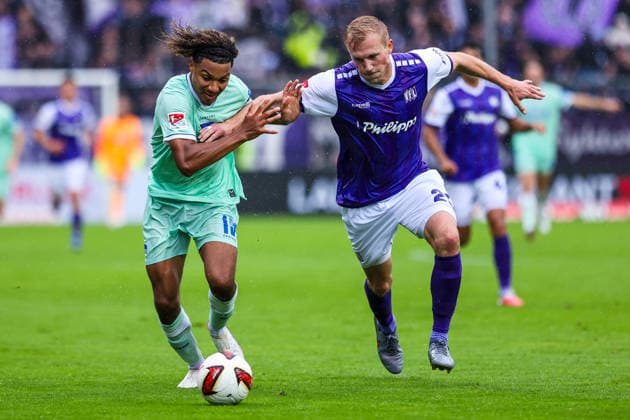 September 13, 2026, xkwix, Soccer, 2nd Division, VfL Osnabrück vs. Hertha BSC, Stadion an der Bremer Brücke, Matchday 5, 2026–2027 season: Oluwaseun Adewumi (Hertha BSC, No. 19) in a tackle with Niklas Wiemann (VfL Osnabrück, No. 25). DFB regulations prohibit any use of photographs as image sequences and or quasi-video. Photo: xKamilxWilkowskixPressefotoKochx Lower Saxony, Germany