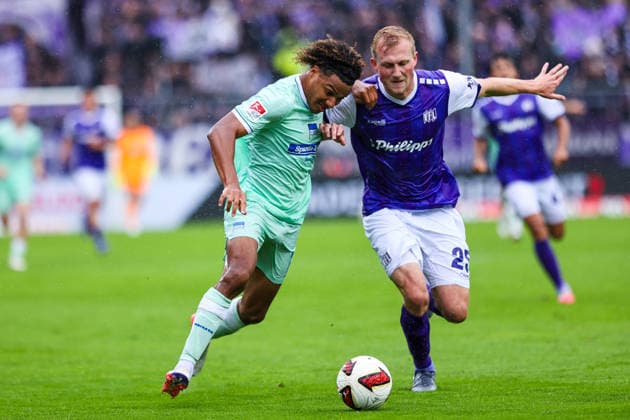 September 13, 2026, xkwix, Soccer, 2nd Division, VfL Osnabrück vs. Hertha BSC, Stadion an der Bremer Brücke, Matchday 5, 2026–2027 season: Oluwaseun Adewumi (Hertha BSC, No. 19) in a tackle with Niklas Wiemann (VfL Osnabrück, No. 25). DFB regulations prohibit any use of photographs as image sequences and or quasi-video. Photo: xKamilxWilkowskixPressefotoKochx Lower Saxony, Germany
