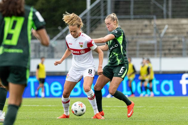 Germany: VfB Stuttgart Women vs. VfL Wolfsburg Women, Women s Bundesliga 1, Google Pixel Women s Bundesliga, 2026–27 season, GAZi Stadium on the Waldau, Stuttgart; Maximiliane Rall, VfB Stuttgart Women, No. 8 in a tackle with Janina Minge, VfL Wolfsburg Women, No. 6, Stuttgart, GAZi Stadium on the Waldau, Baden-Württemberg, Germany Copyright: xBenedictxChristx
