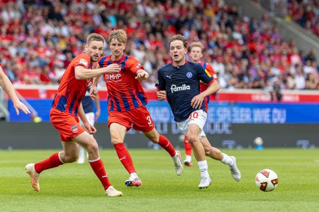 Tackle: Patrick Mainka (1. FC Heidenheim), Jan Schoeppner (1. FC Heidenheim), Leon Parduzi (Holstein Kiel), 40, GER, 1 FC Heidenheim vs. Holstein Kiel, Soccer, 2. Bundesliga, Matchday 5, 2026–2027 Season, September 13, 2026, DFL and DFB regulations prohibit any use of photographs as image sequences and or quasi-video, GER, 1 FC Heidenheim vs. Holstein Kiel, Soccer, 2. Bundesliga, Matchday 5, 2026–2027 Season, September 13, 2026, Heidenheim Copyright: xEibner-Pressefoto JanixPlessx EP_JPL
