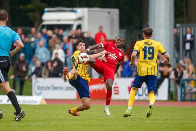 Left: Pepe Böhm (Lok) vs. Grace Bokake, Greifswald, GER; Greifswalder FC vs. 1. FC Lok Leipzig; Soccer, Men’s, Northeast Regional League, Matchday 8, 2026–2027 Season, September 13, 2026, Greifswald Volksstadion, Mecklenburg-Western Pomerania, Germany