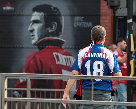 Premier League: Manchester United, ManU v Manchester City A Manchester United fan with a Cantona 18 shirt on during the Premier League match Manchester United vs Manchester City at Old Trafford, Manchester, United Kingdom on 13 September 2026 (Photo by Mark Cosgrove News Images) Manchester Old Trafford Greater Manchester United Kingdom Copyright: xMarkxCosgrove NewsxImagesx