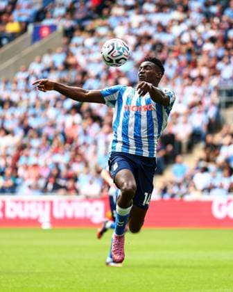 Taiwo Awoniyi of Coventry City in action Coventry City v Brighton and Hove Albion, Premier League, Football, Football, Coventry Building Society Arena, Coventry, UK - 13 Sep 2026Coventry Coventry Building Society Arena United Kingdom EDITORIAL USE ONLY No use with unauthorised audio, video, data, fixture lists, club league logos or live services. Online in-match use limited to 120 images, no video emulation. No use in betting, games or single club league player publications.  Copyright: xJamesxMarsh Shutterstockx 17144596ea