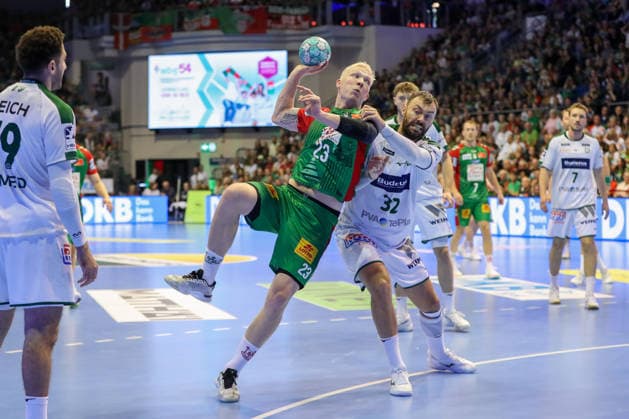 September 13, 2026, xgox, Handball Opel HBL SC Magdeburg vs. HSG Wetzlar emspor, from left: Magnus Saugstrup (Magdeburg), 23, takes a shot, goal scorer, scores a goal, Magdeburg