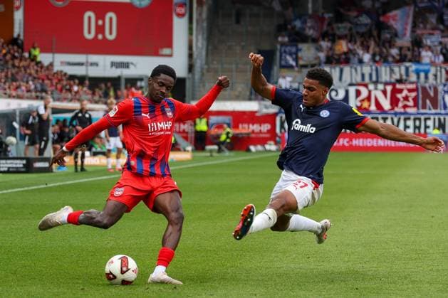 Christian Conteh 10 (1. FC Heidenheim 1846) in action against Ikem Ugoh 27 (Holstein Kiel), 1. FC Heidenheim 1846 vs. Holstein Kiel, Soccer, DFL, 2. Bundesliga, 2026–2027 Season, First Half of the Season, Matchday 5, September 13, 2026, Heidenheim, Baden-Württemberg, Germany Copyright: xkolbert-press MartinxAgüerax